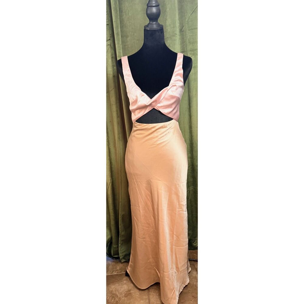Fortunate One Dress two-tone sleeveless maxi dress with a cutout waist.
